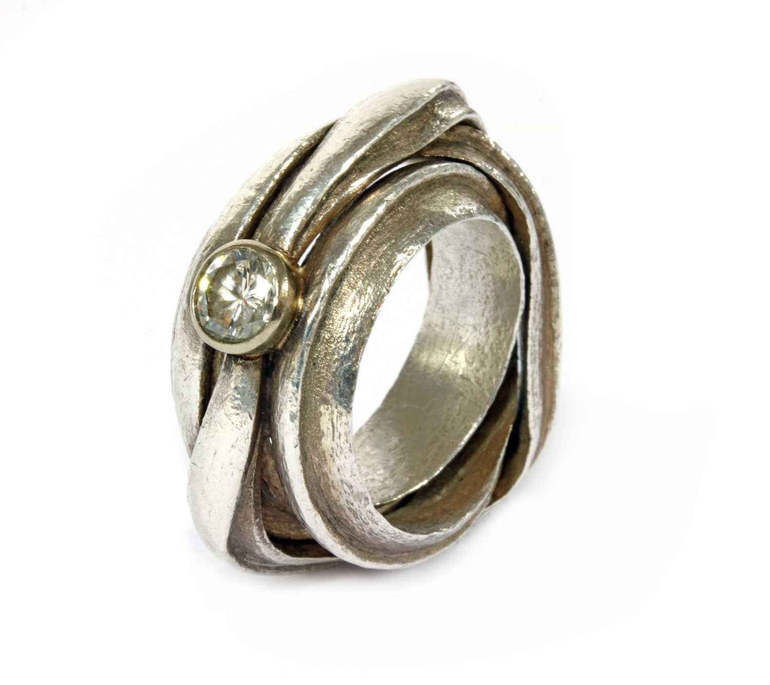 A fine silver single stone diamond ring by Michael Carberry,