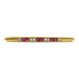 An Art Deco, gold, ruby and diamond bar brooch,