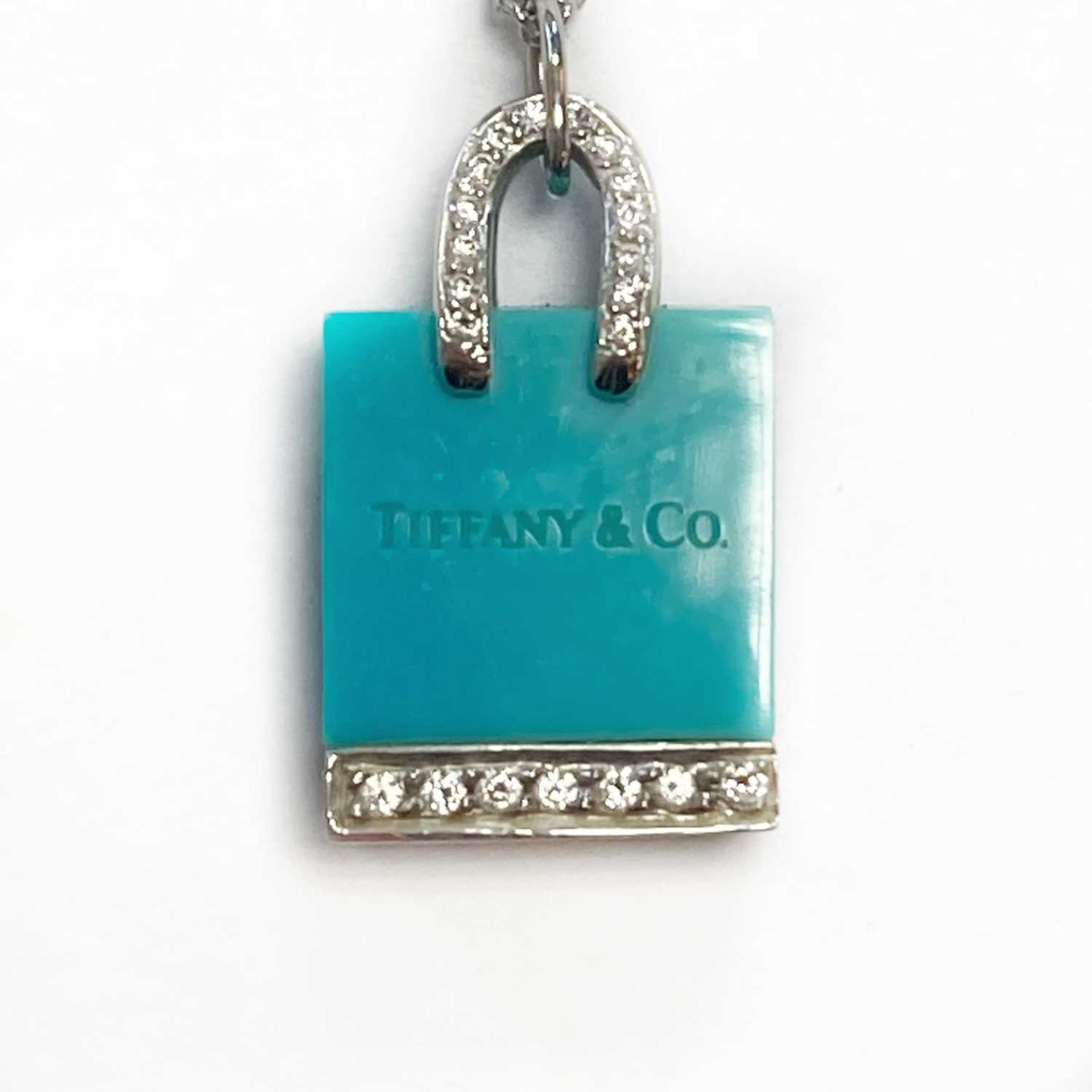 A platinum turquoise and diamond shopping bag pendant/charm by Tiffany & Co., - Bild 3 aus 8