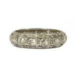 A white gold diamond full eternity ring,