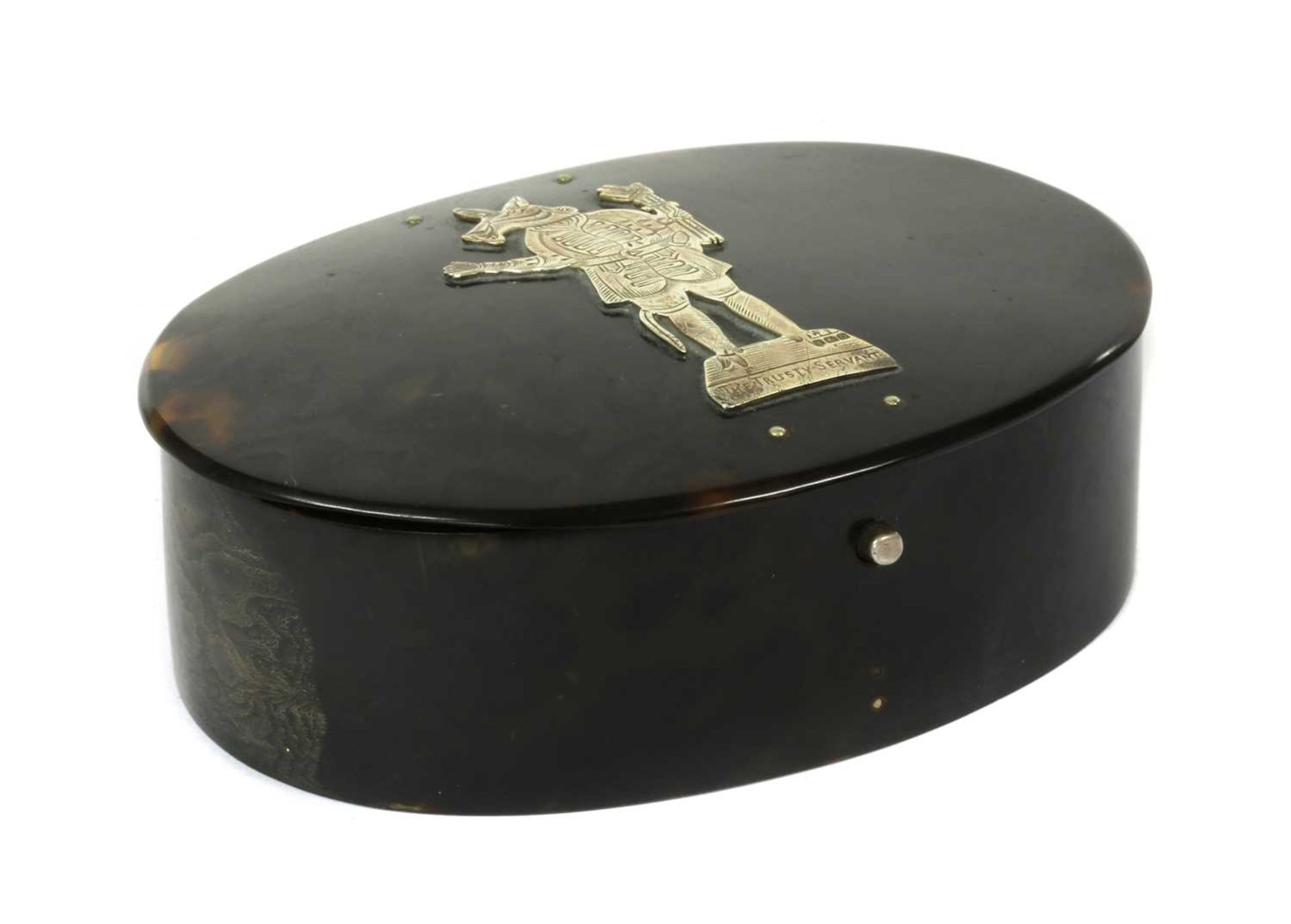 An oval tortoiseshell box,