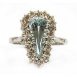 A white gold aquamarine and diamond cluster ring,