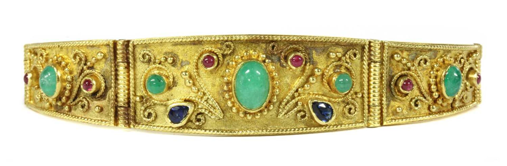 A gold emerald, sapphire and ruby bracelet,