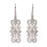 A pair of white gold diamond drop earrings,