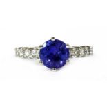 An 18ct white gold tanzanite and diamond ring,