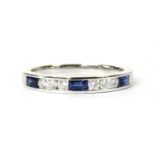 A white gold sapphire and diamond half eternity ring,