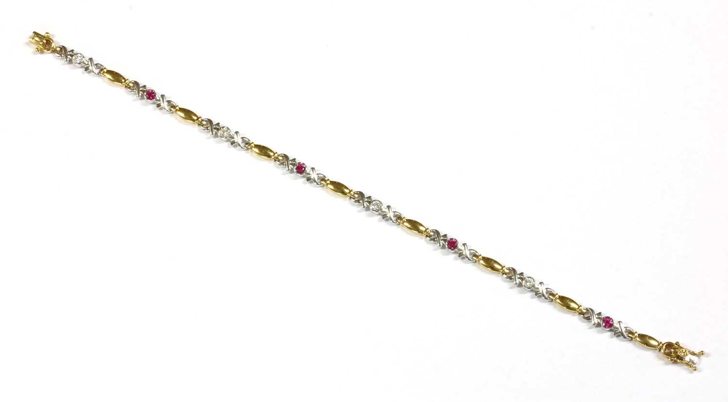 A two colour gold ruby and diamond bracelet,
