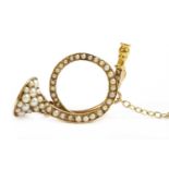 A gold split pearl brooch,