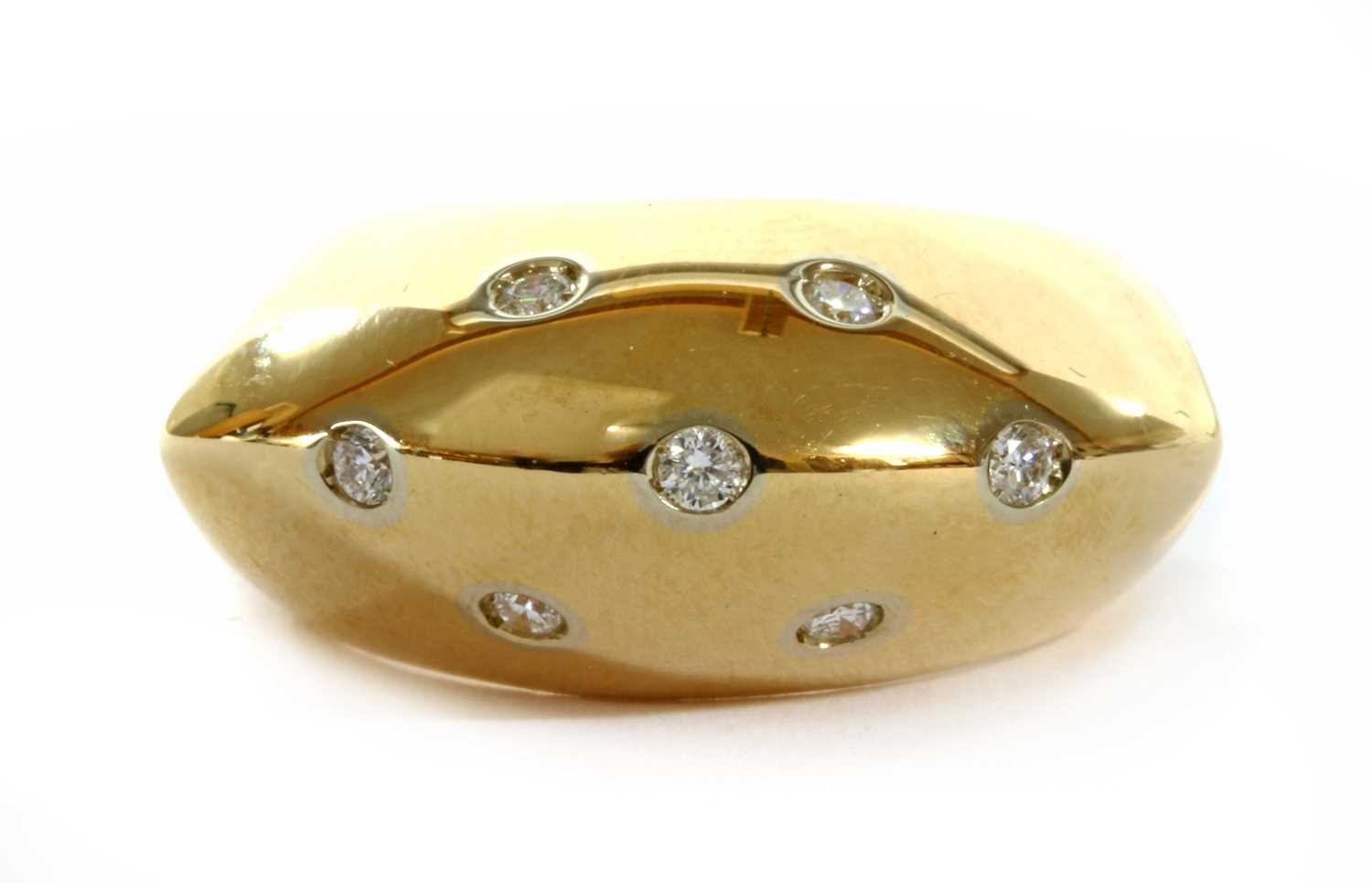 A gold diamond bombé ring,