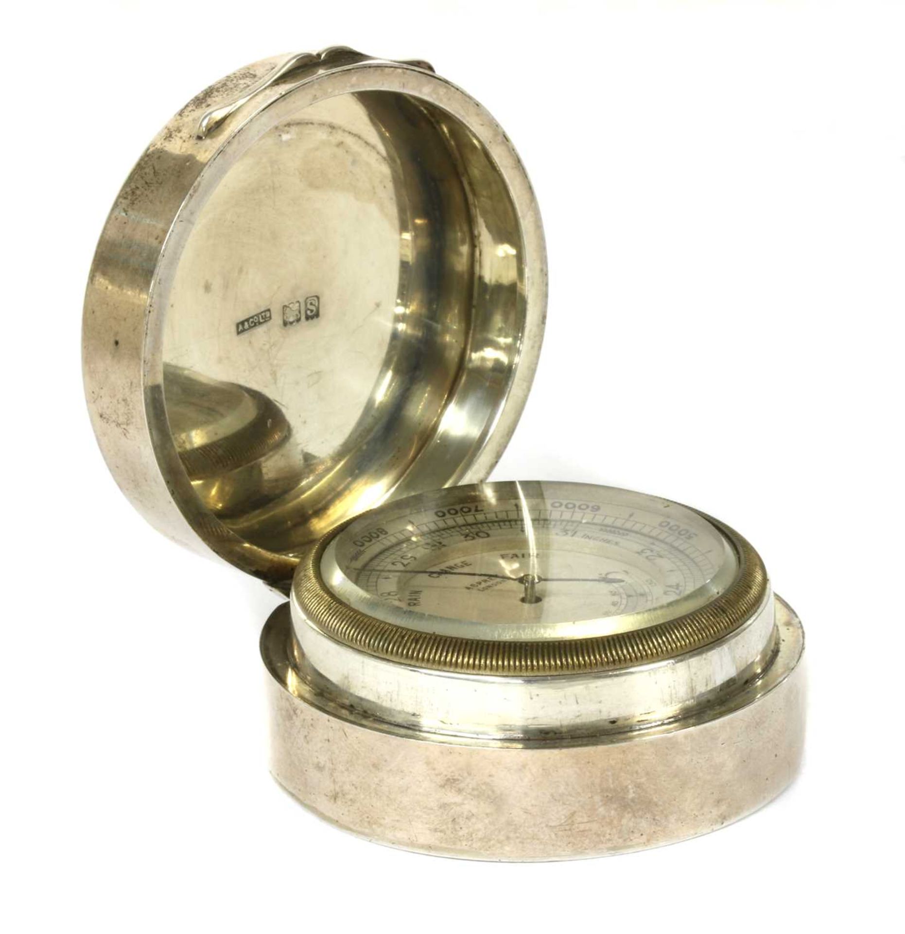A sterling silver cased travel barometer by Asprey,