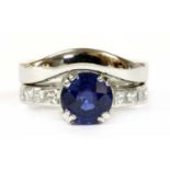 A white gold sapphire and diamond ring,