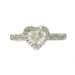 A white gold heart cut diamond halo cluster ring,