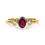 An 18ct gold ruby and diamond three stone ring,