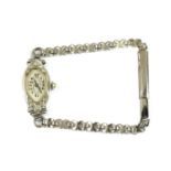 An Art Deco ladies' white gold diamond set cocktail watch,