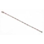 An 18ct white gold pink sapphire and diamond bracelet,