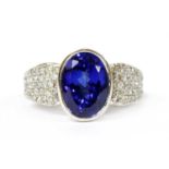 A white gold single stone tanzanite ring,