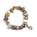 A sterling silver Lovelinks charm bracelet,