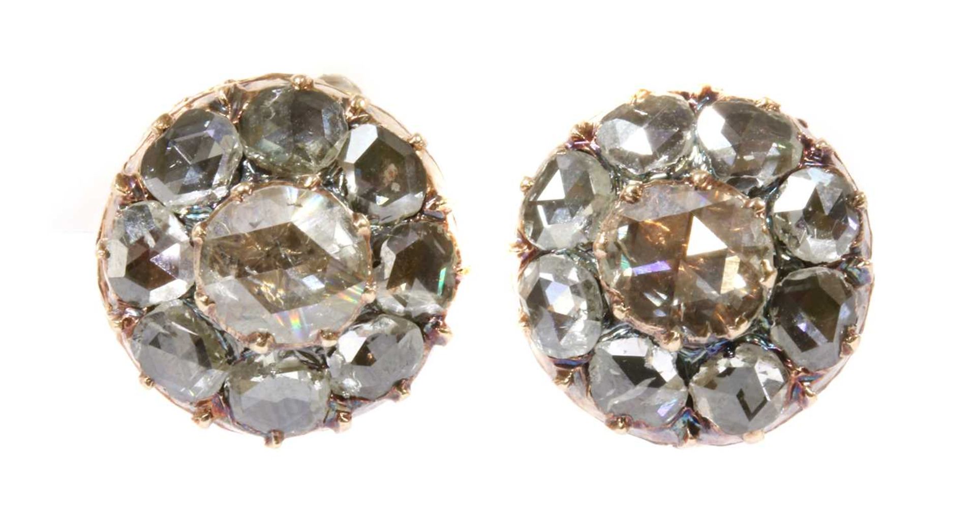 A pair of early 20th century diamond cluster earrings,