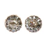 A pair of early 20th century diamond cluster earrings,