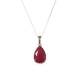 A white gold single stone ruby pendant,
