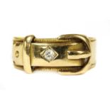 An 18ct gold diamond set buckle ring,