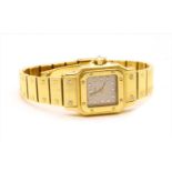 A ladies' 18ct gold Cartier Santos automatic bracelet watch,