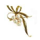 A gold cultured pearl spray brooch by Mikimoto,