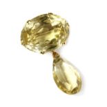 A gold citrine brooch,