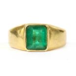 A gold single stone emerald ring,