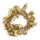 A gold charm bracelet,