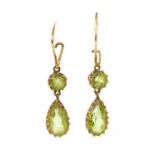 A pair of Edwardian gold peridot drop earrings,