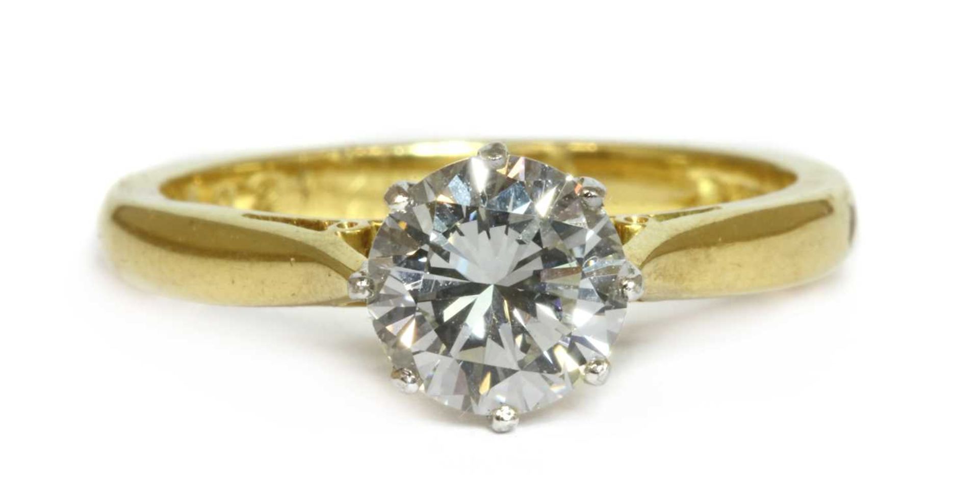 An 18ct gold single stone diamond ring,