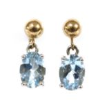 A pair of gold aquamarine drop earrings,