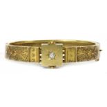 A Victorian Etruscan Revival gold diamond hinged bangle, c.1870,