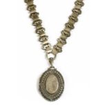 A Victorian sterling silver locket and collar,
