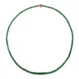 A single row graduated faceted emerald bead necklace,