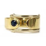 A gold single stone sapphire ring,