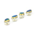 A set of sterling silver and gold boulder opal dress studs by Josef Koppmann,