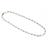 A platinum diamond and seed pearl necklace,