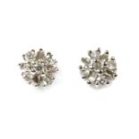 A pair of white gold diamond cluster earrings,