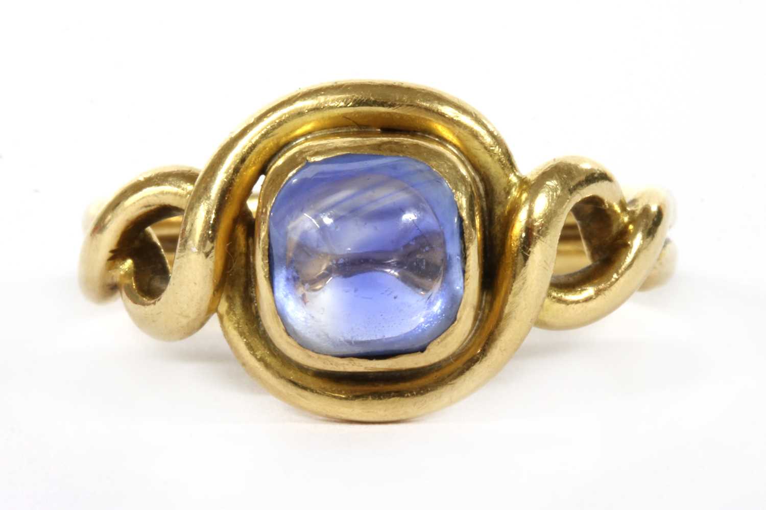 A gold single stone sapphire ring,