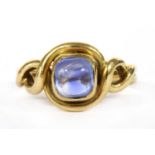 A gold single stone sapphire ring,