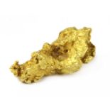 A high carat gold nugget,
