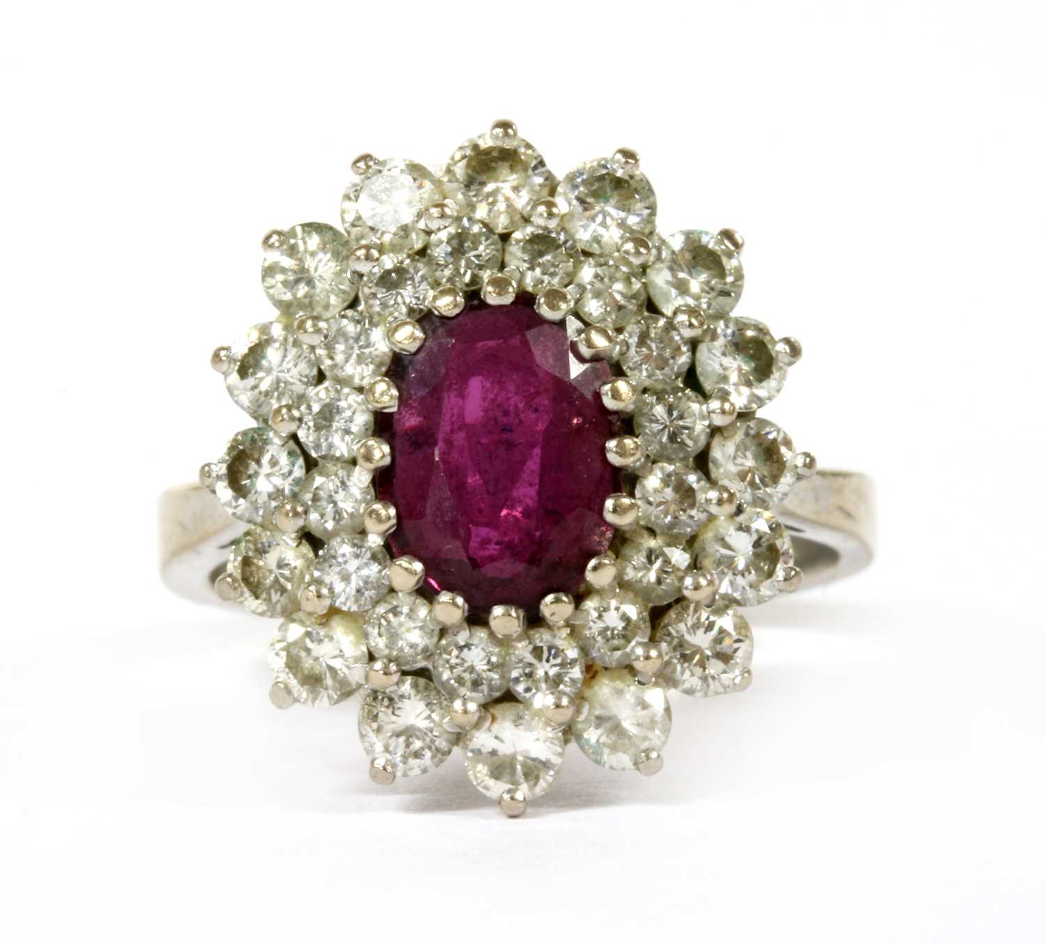 A white gold ruby and diamond cluster ring,