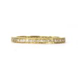 A gold diamond full eternity ring,