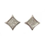 A pair of 9ct white gold diamond stud earrings,