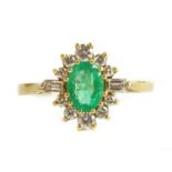 An 18ct gold emerald and diamond cluster ring,