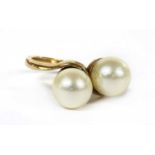 A 9ct gold two stone cultured pearl crossover ring,