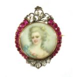 A gold ruby and diamond set miniature portrait brooch,