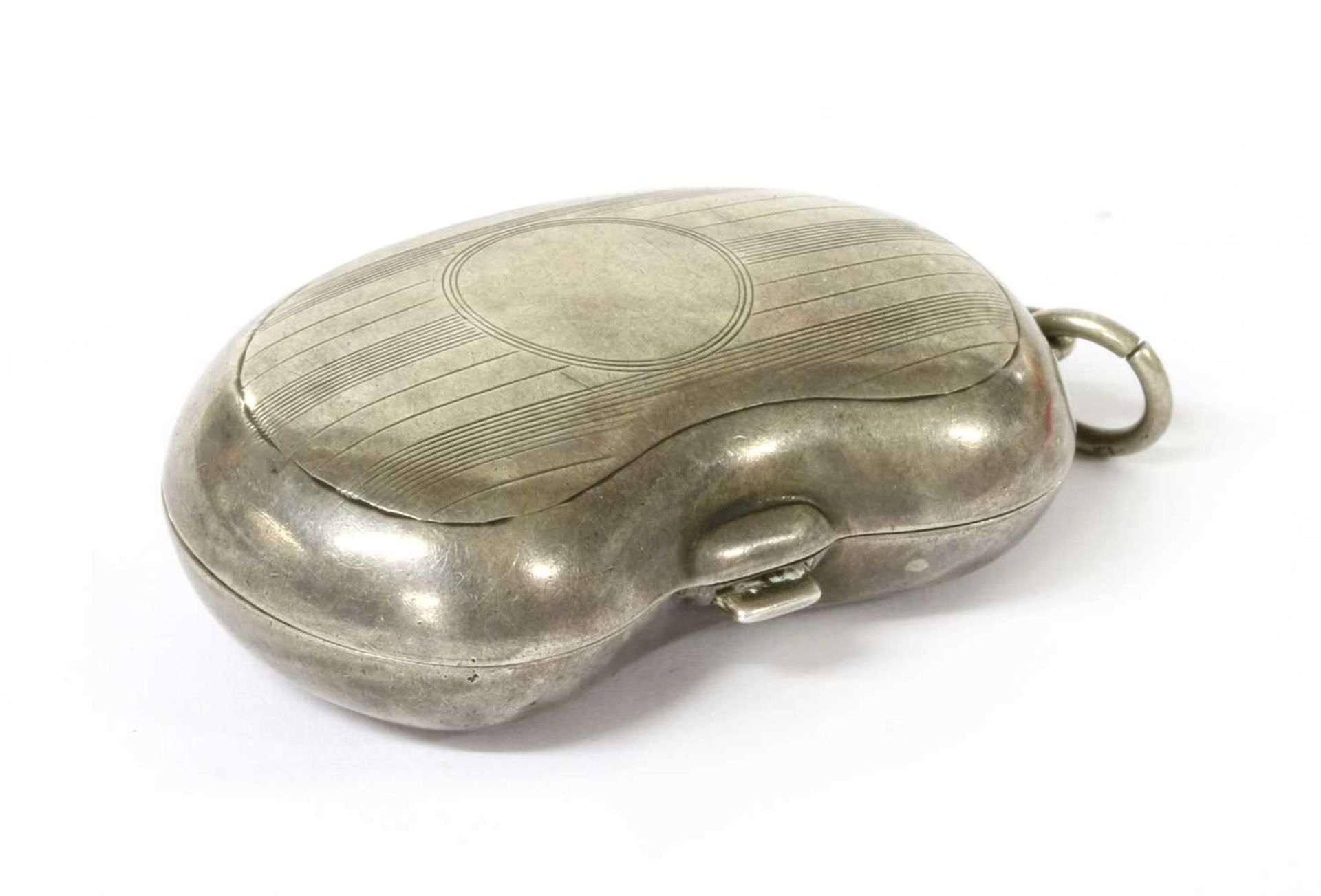 A sterling silver kidney-shaped twin section sovereign holder,
